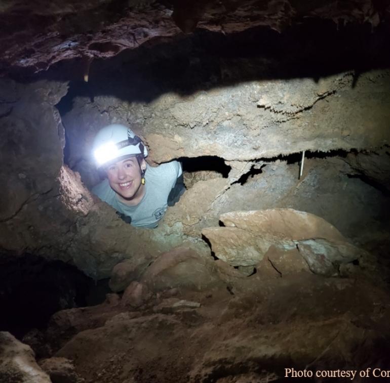 Co-author Grace Allison exploring cave in Tonto National Forest.